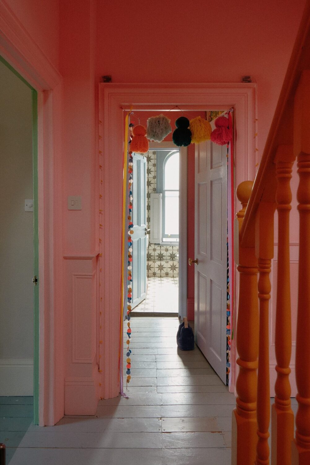 A Fun Colorful Family House in England 26 hallway-pink-walls-nordroom