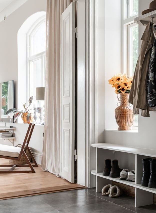 A Former Swedish School is Now a Beautiful Home 17 hallway-shoe-storage-bench-nordroom