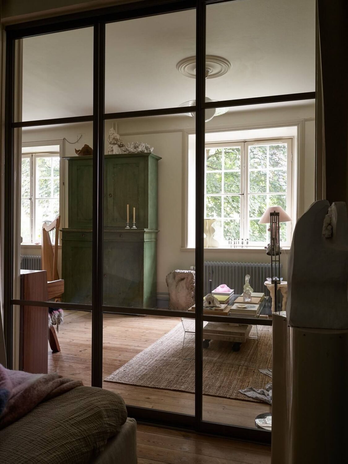 Sliding Glass Doors in a Scandinavian Apartment 14 industrial-glass-wall-between-bedroom-and-living-nordroom