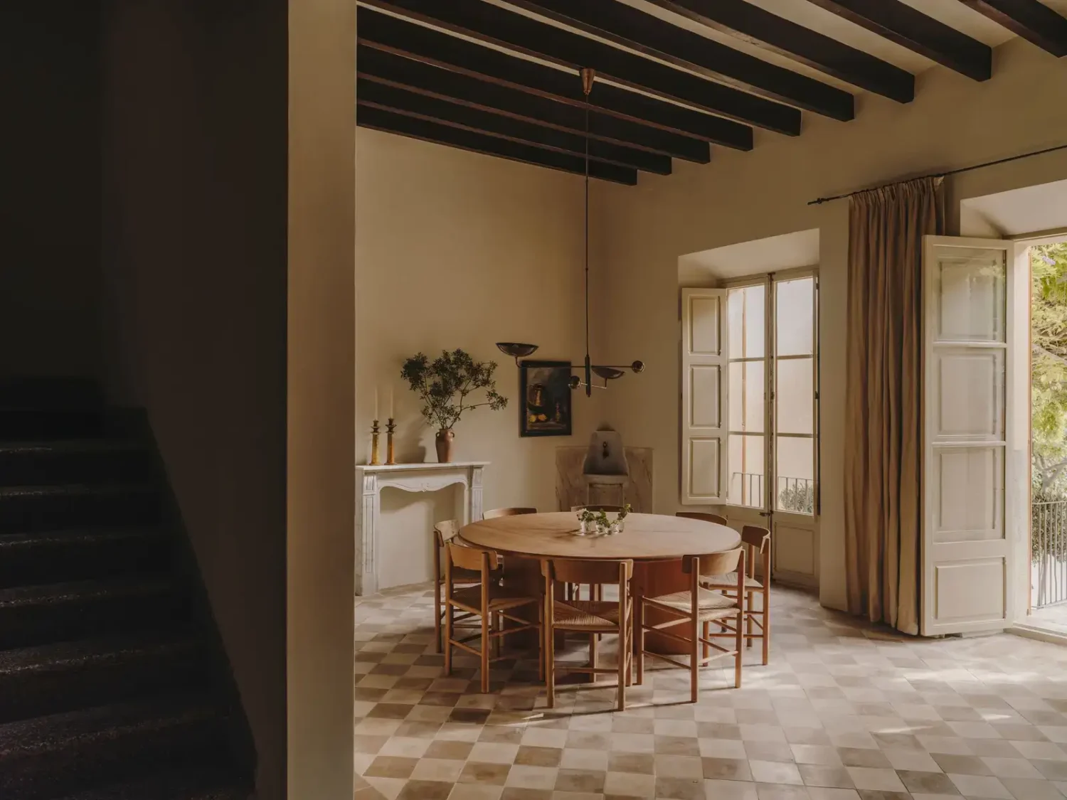 A Historic Townhouse on Majorca with a Striped Pool 2 kitchen-dining-area-checkerboard-floor-tiles-nordroom