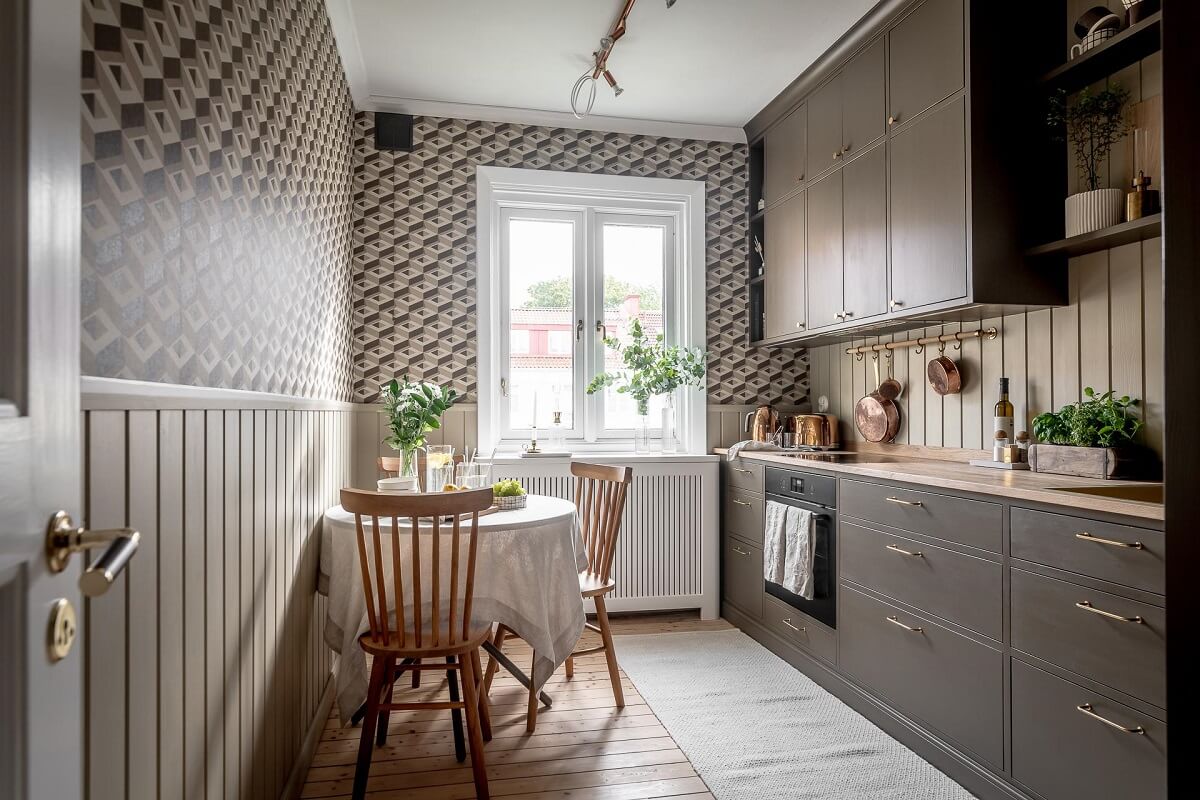 Best of 2023: Studio Apartments 16 kitchen-geometric-wallpaper-brown-cabinets-nordroom