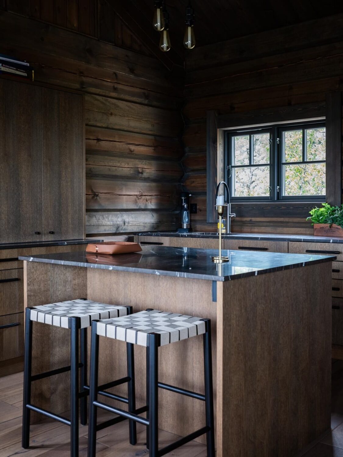 A Modern Rustic Log House in Sweden 7 kitchen-island-modern-rustic-log-house-nordroom