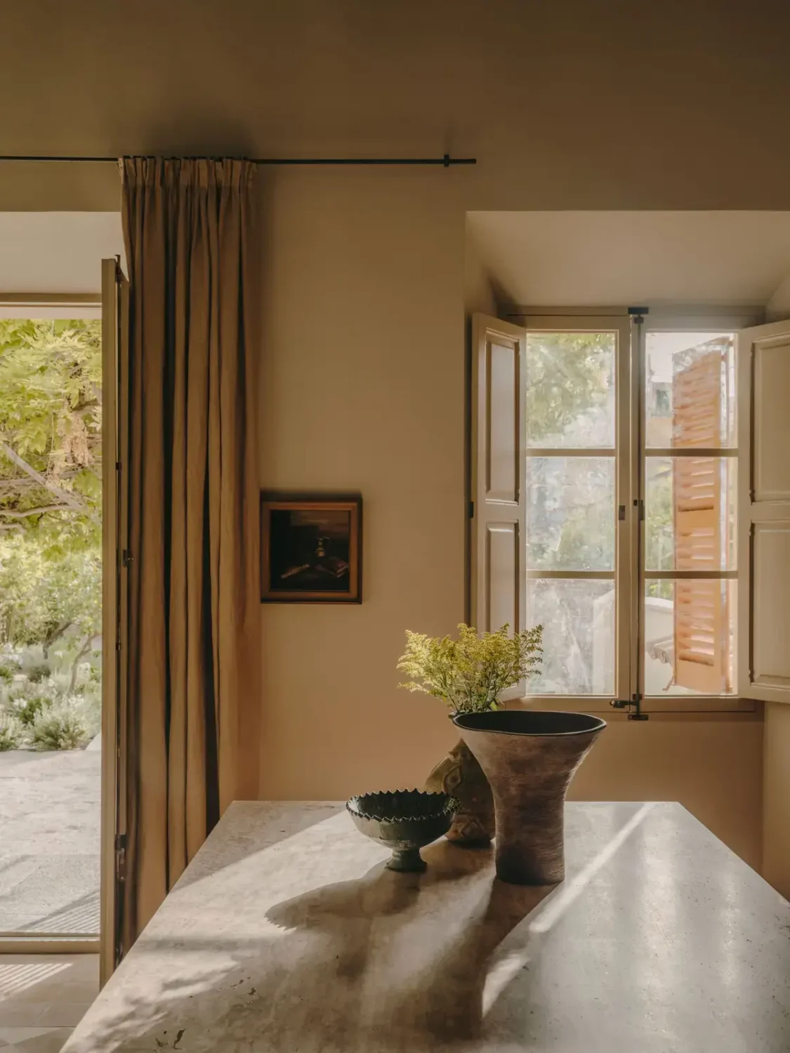 A Historic Townhouse on Majorca with a Striped Pool 4 kitchen-light-window-shutters
