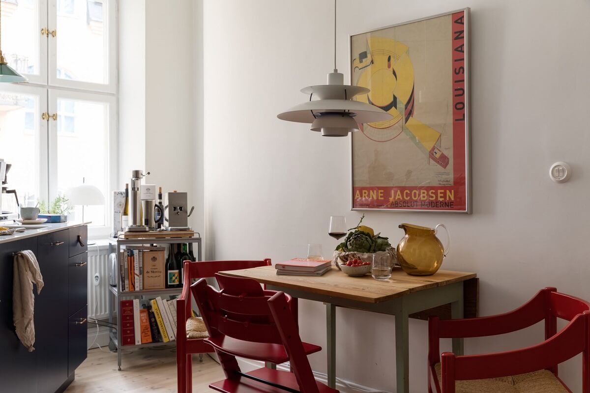 A Light Swedish Apartment with an Industrial Glass Wall 11 kitchen-table-nordroom