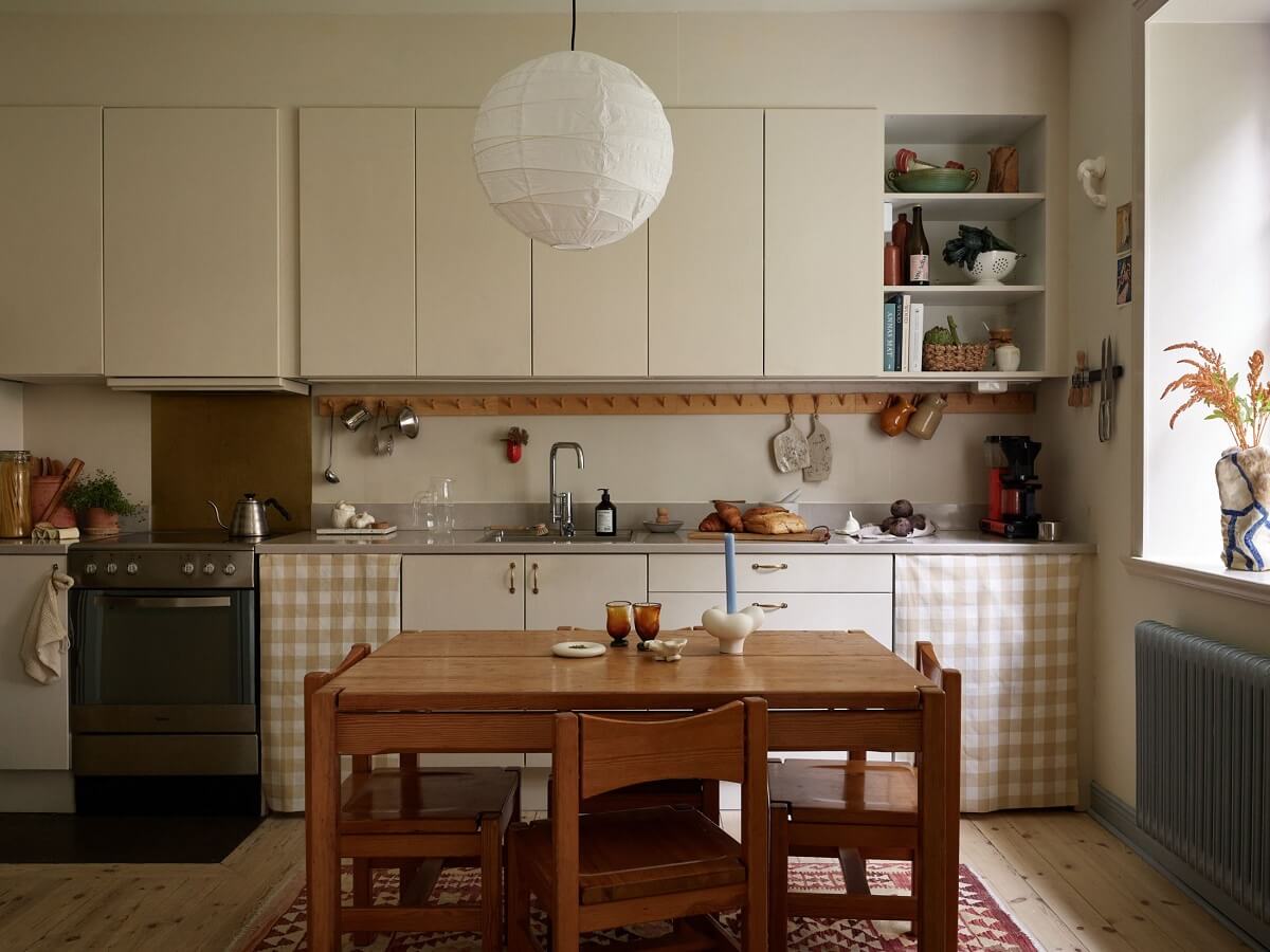 Sliding Glass Doors in a Scandinavian Apartment 17 kitchen-with-wooden-dining-table-nordroom