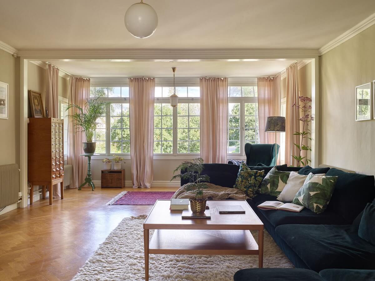 A Beautiful Swedish Country House with a Large Garden 26 large-blue-velvet-sofa-family-room-nordroom
