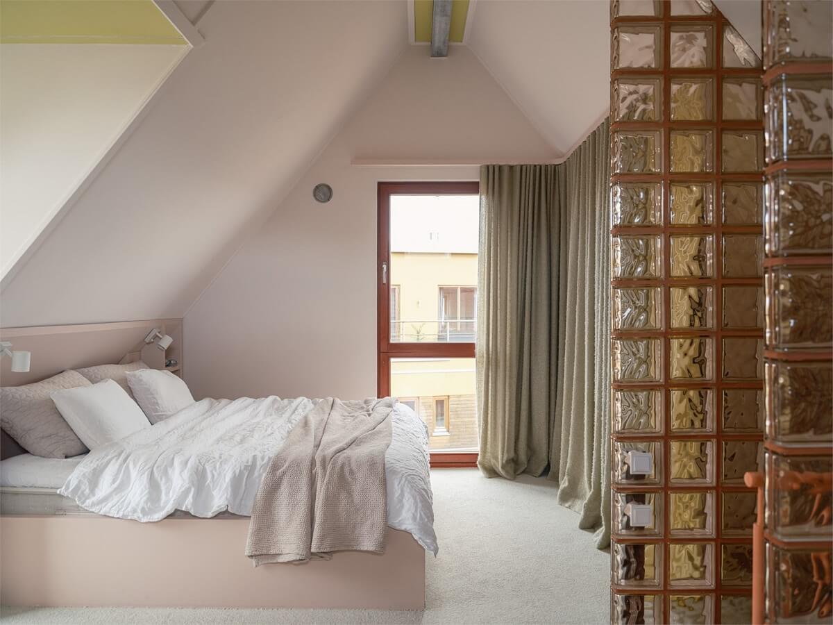 A Colorful Modern Townhouse in Malmö 12 light-bedroom-pitched-roof-nordroom