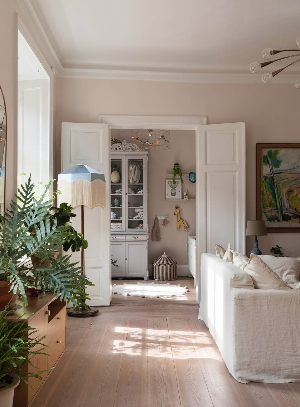 A Lovely Swedish House Revisited 2 light-living-room-double-doors-nordroom
