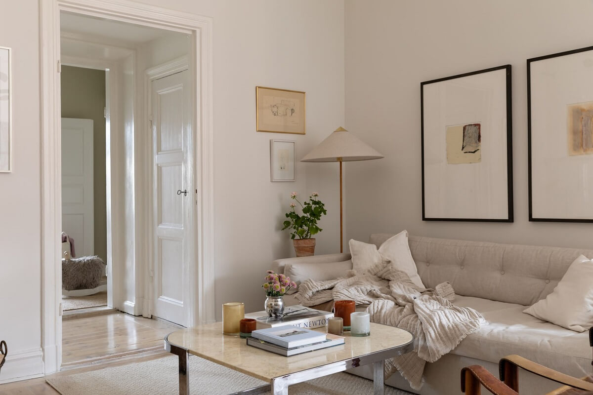 A Light Swedish Apartment with an Industrial Glass Wall 4 light-living-rooom