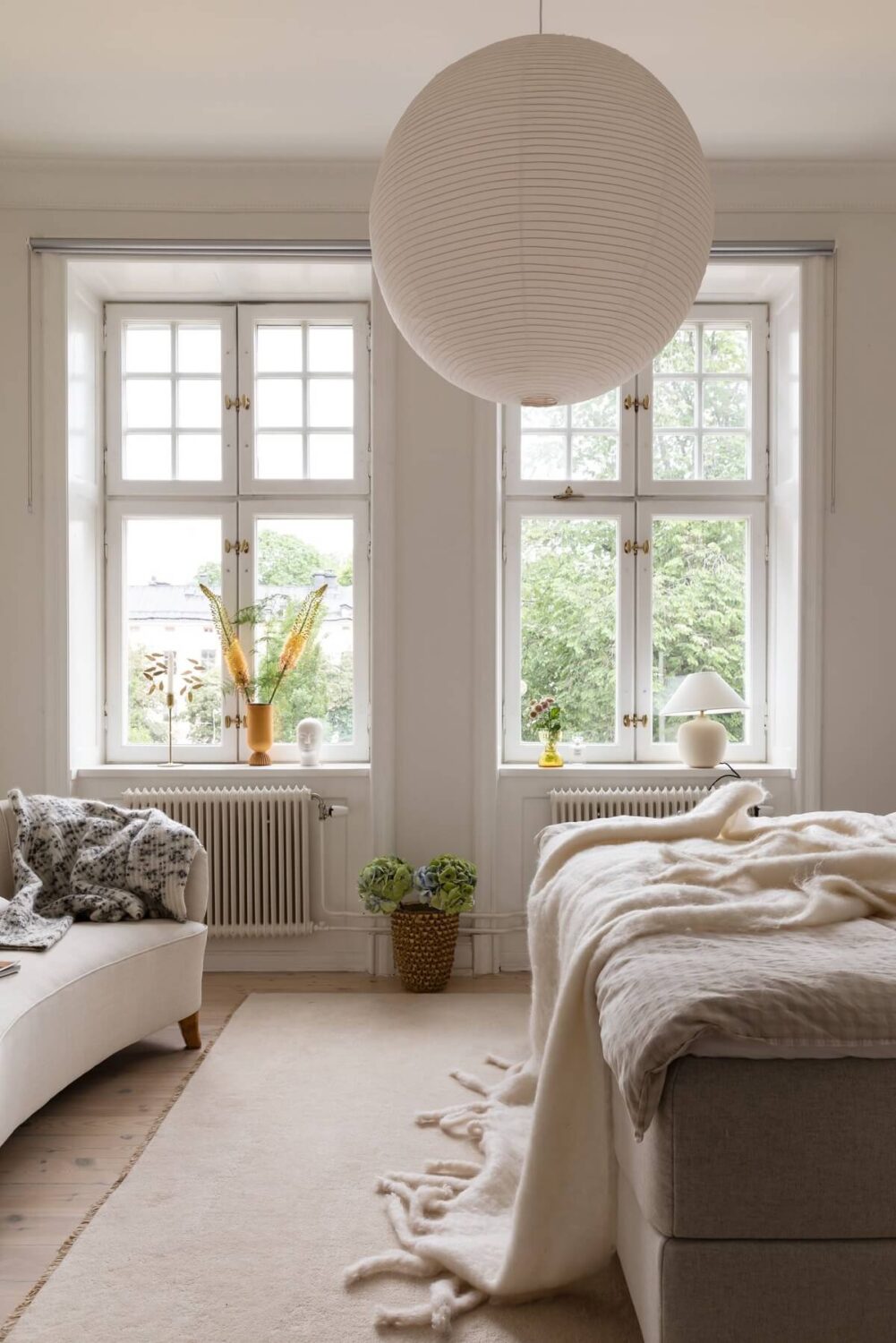 A Light Swedish Apartment with an Industrial Glass Wall 19 light-master-bedroom-with-seating-nordroom