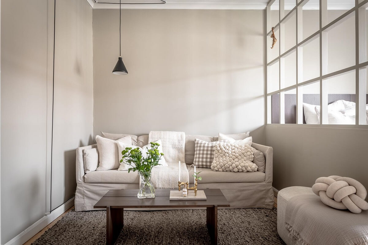 A Serene Studio Apartment with a Brown Kitchen 4 light-neutral-studio-apartment-nordroom