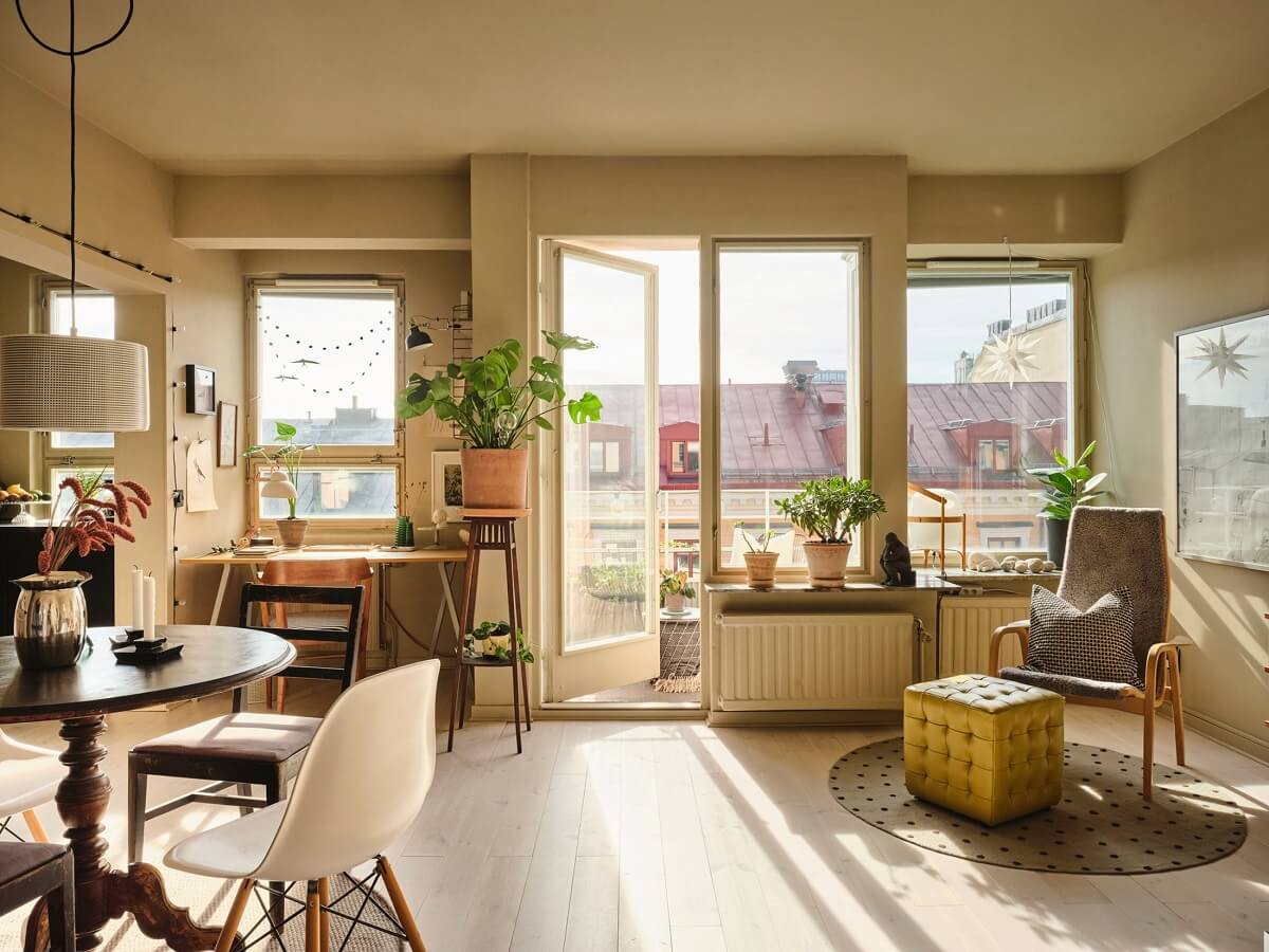 A Serene Beige Apartment with Two Balconies 6 light-open-living-room-with-balcony-nordroom