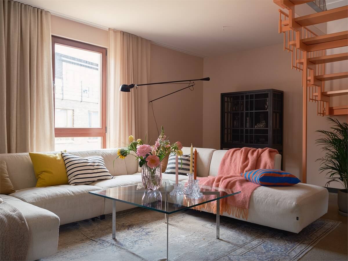 A Colorful Modern Townhouse in Malmö 8 light-pink-living-room-colorful-accents-nordroom