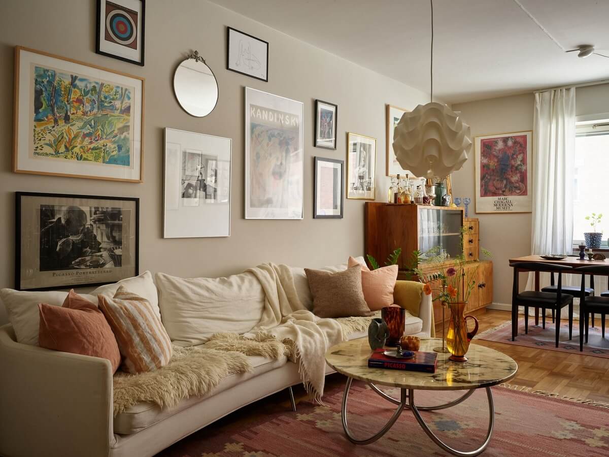 A Scandinavian Apartment with a Fresh Blue Bedroom 1 living-room-gallery-wall-pink-rug-nordroom