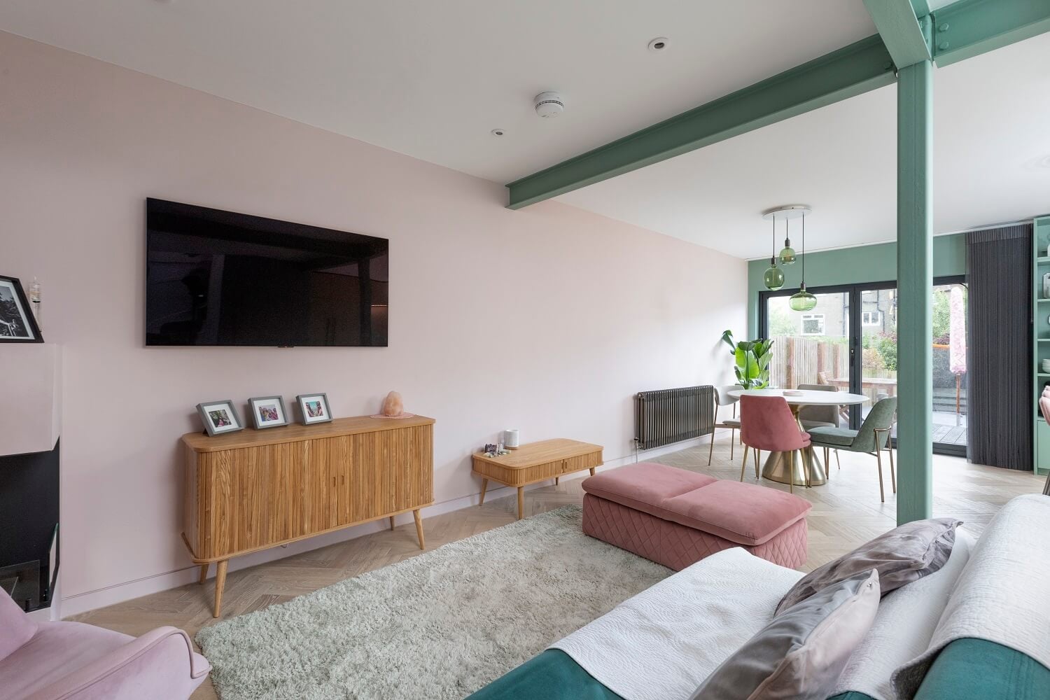 An Open-Plan Living and Kitchen in Green and Pink Tones 11 living-room-pink-green-color-palette-nordroom