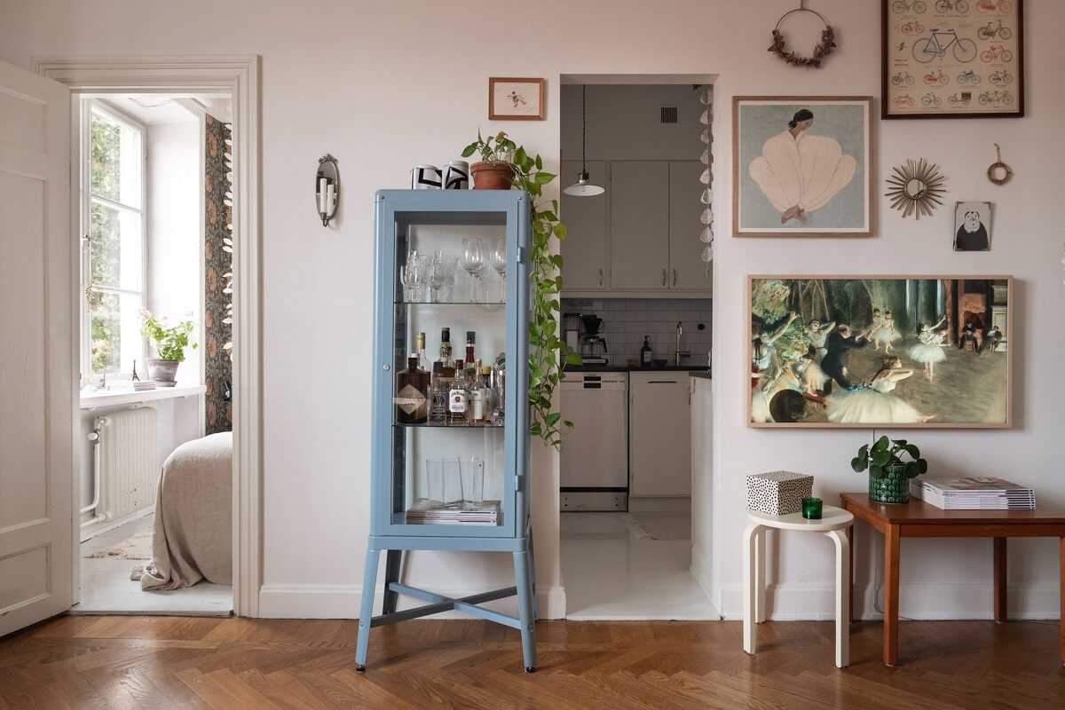 A Lovely Swedish Apartment with William Morris Bedroom 9 living-room-with-half-open-kitchen-nordroom