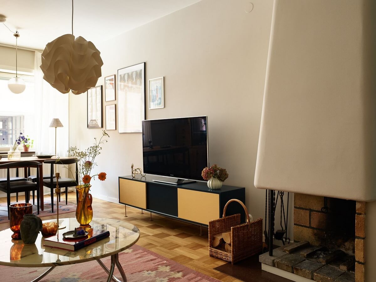 A Scandinavian Apartment with a Fresh Blue Bedroom 7 living-room-wooden-floor-fireplace-nordroom