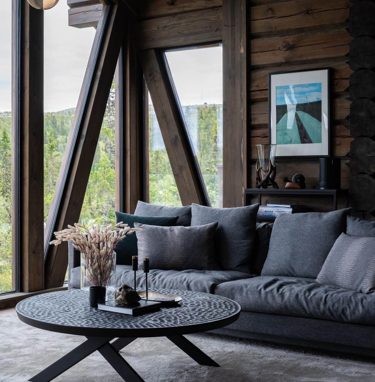 A Modern Rustic Log House in Sweden 2 log-house-living-room-floor-to-ceiling-windows-nordroom