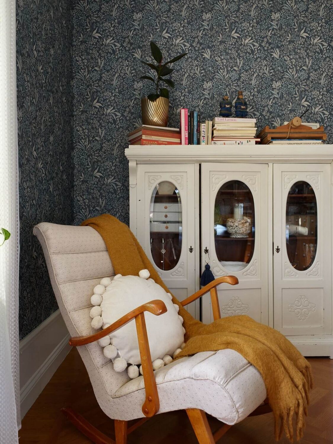 A Beautiful Swedish Country House with a Large Garden 15 lounge-chair-mustard-yellow-throw-blue-wallpaper-nordroom