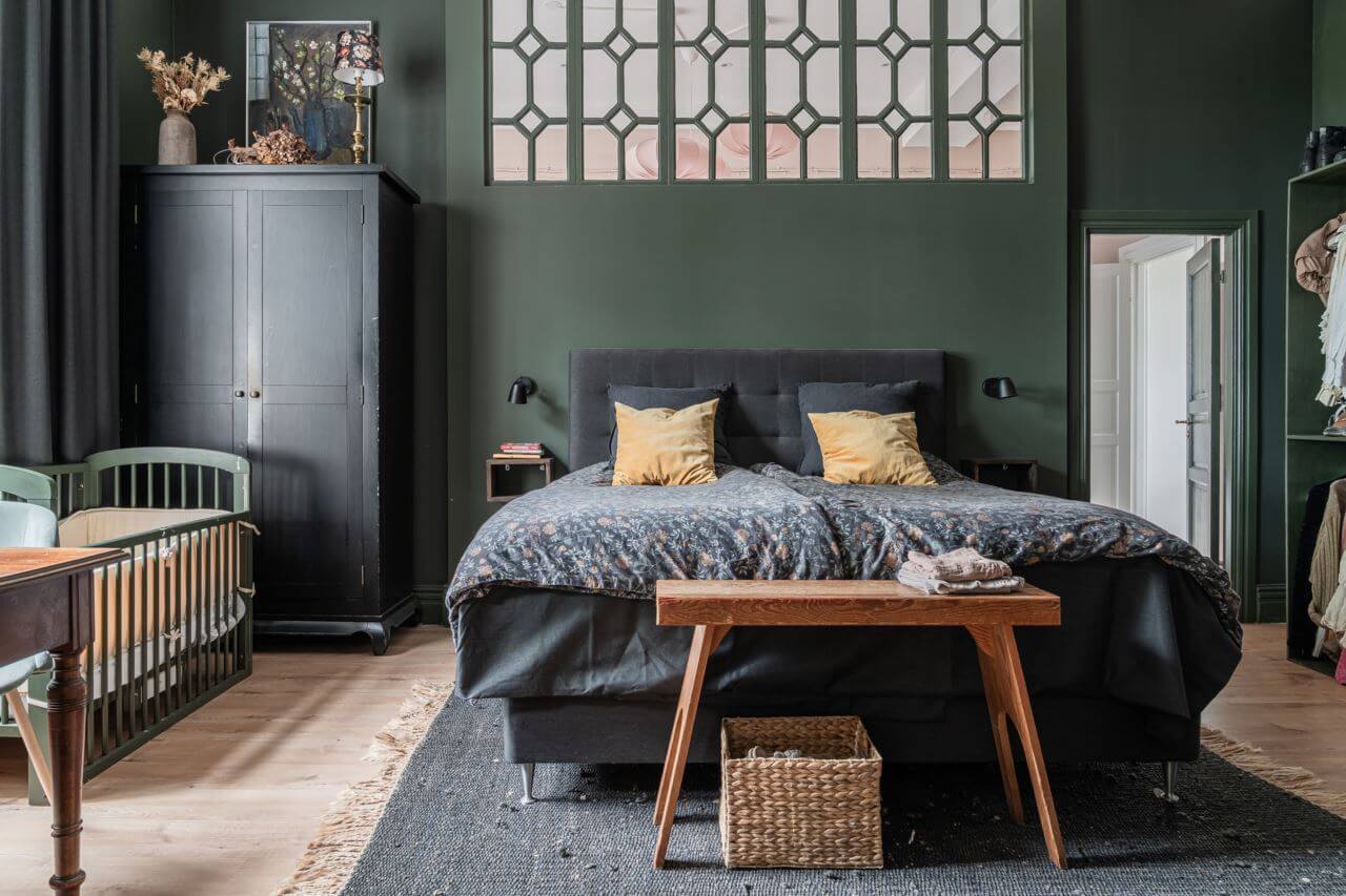 A Former Swedish School is Now a Beautiful Home 19 master-bedroom-nursery-dark-green-walls-nordroom