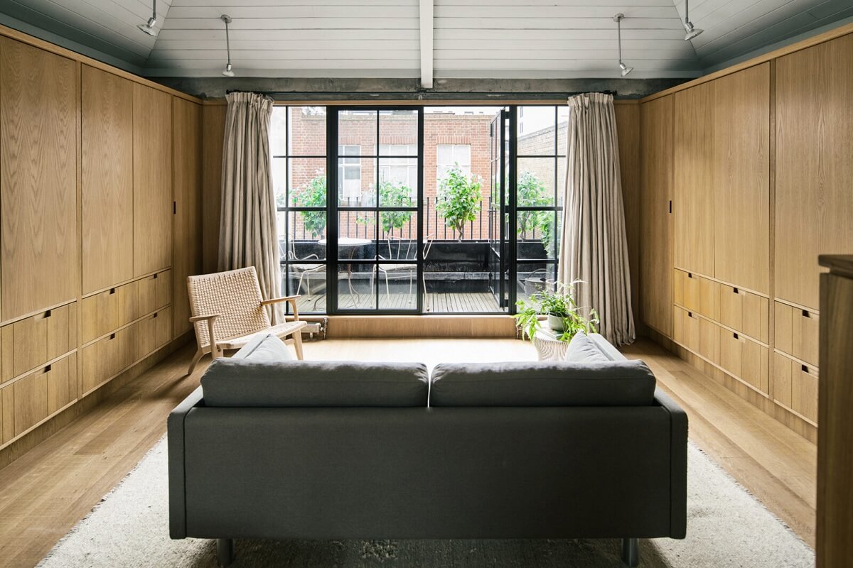 A Modern London Home with Custom Built Oak Furniture 18 master-bedroom-seating-area-oak-wardrobes-nordroom