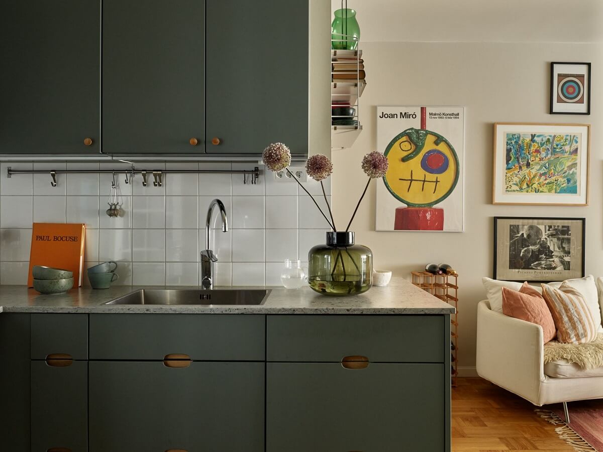 A Scandinavian Apartment with a Fresh Blue Bedroom 11 modern-green-kitchen-cabinets-nordroom