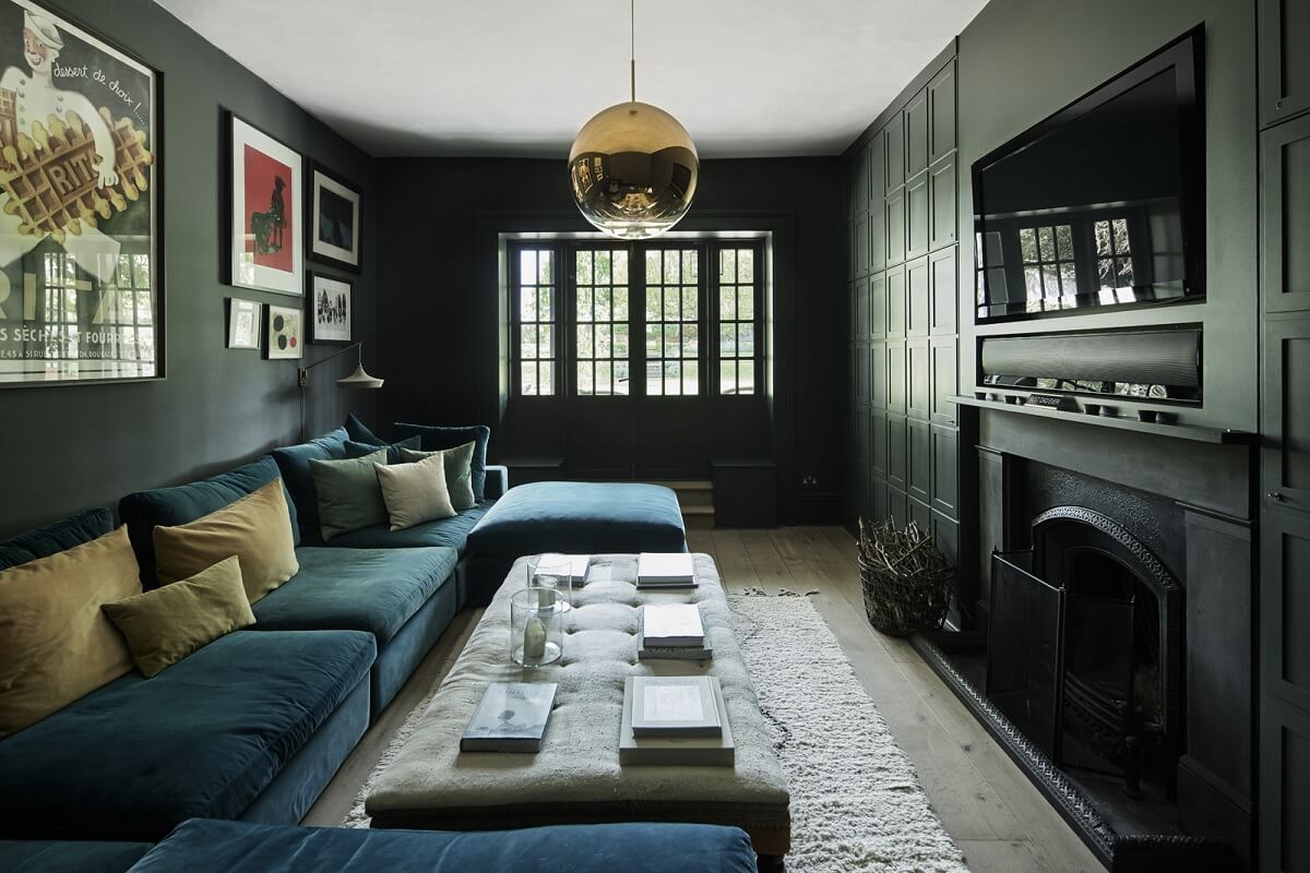 A Restored Georgian House with a Walled Garden 5 moody-dark-gray-tv-room-blue-sofa-nordroom