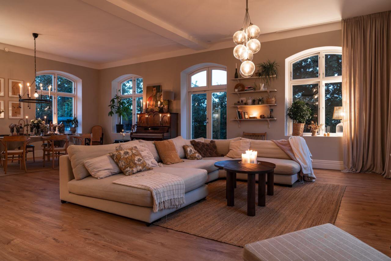 A Former Swedish School is Now a Beautiful Home 15 natural-colored-living-room-evening-shot-nordroom