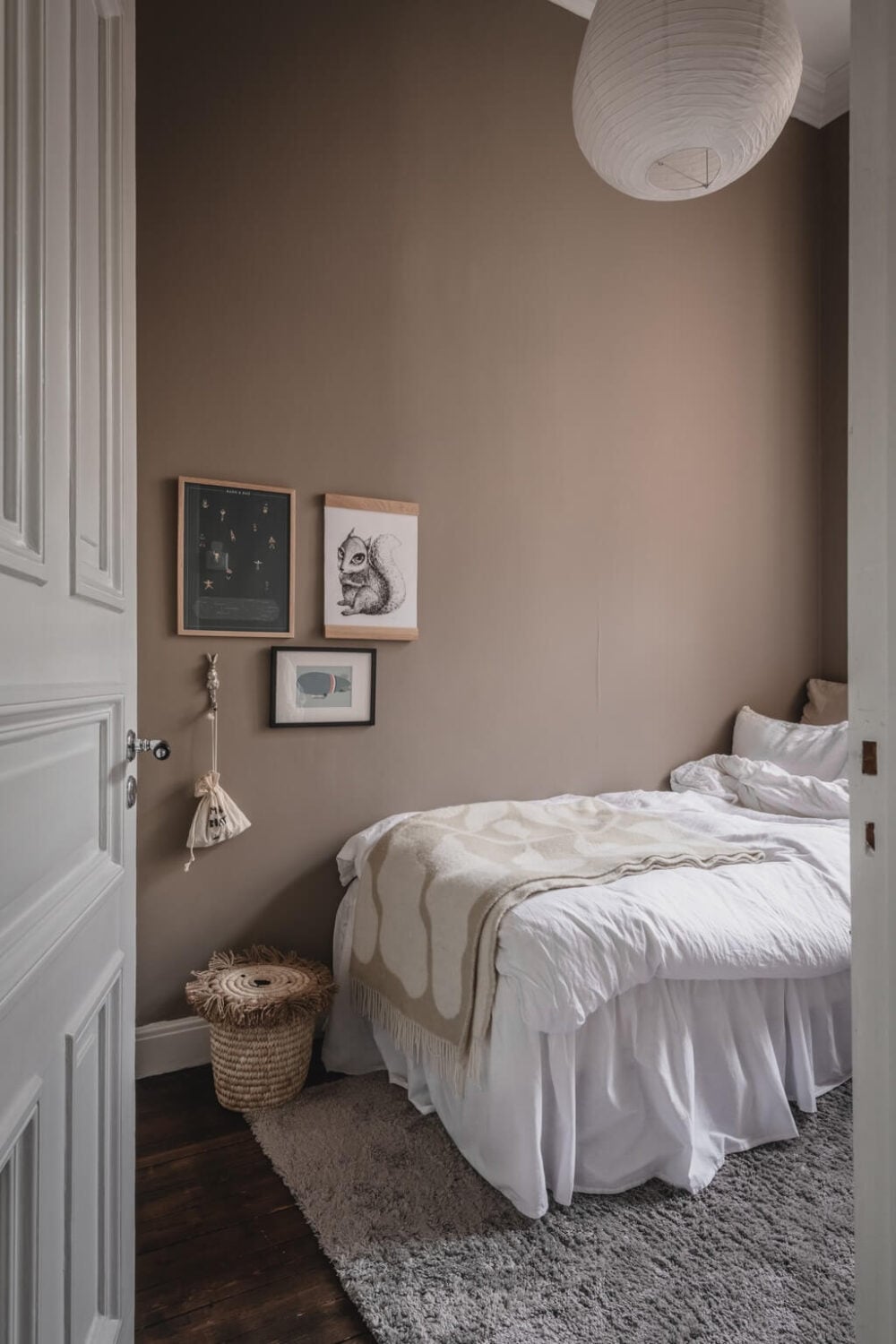 A Dark Gray Painted Ceiling in a Scandi Apartment 17 neutral-bedroom-taupe-walls-nordroom