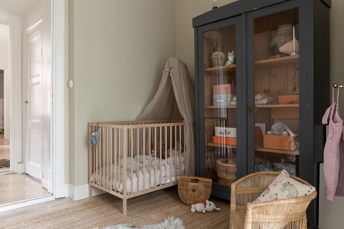 A Light Swedish Apartment with an Industrial Glass Wall 15 nursery-with-glass-wardrobe-nordroom