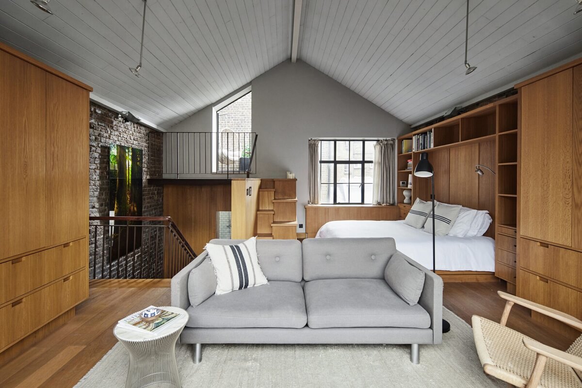 A Modern London Home with Custom Built Oak Furniture 17 open-plan-bedroom-seating-area-custom-built-in-furniture-nordroom