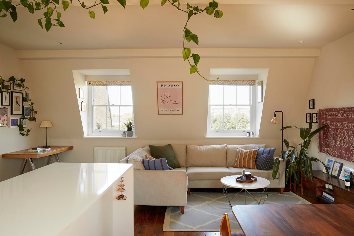 A Light Attic Apartment in London 2 open-plan-living-room-slanted-ceiling-nordroom