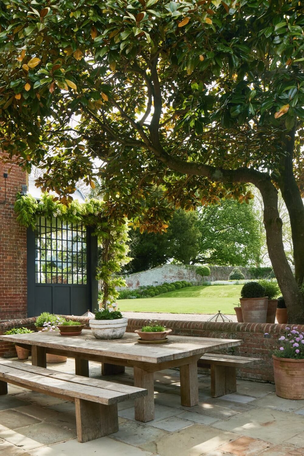 Best of 2023: Outdoor Spaces 25 outdoor-terrace-under-tree-nordroom