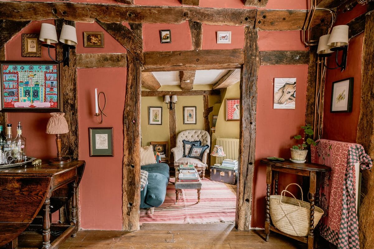 A Charming English Cottage with Color Accents 1 picture-gallery-red-dining-room-walls-exposed-beams-cottage-england-nordroom