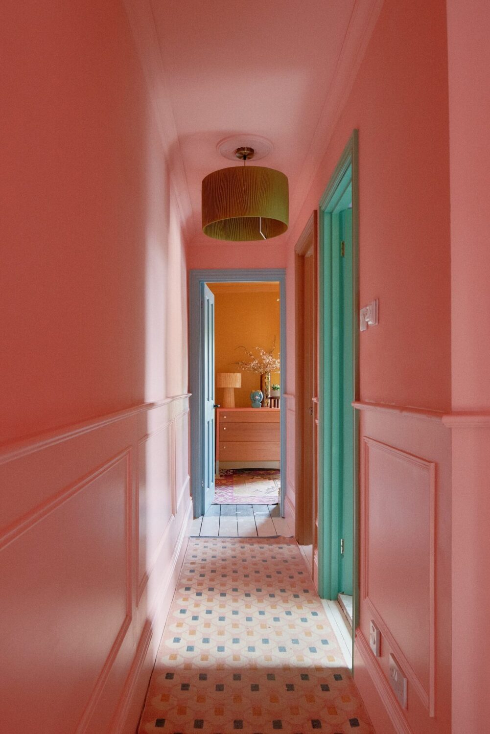 A Fun Colorful Family House in England 19 pink-hallway-with-colorful-tiles-nordroom