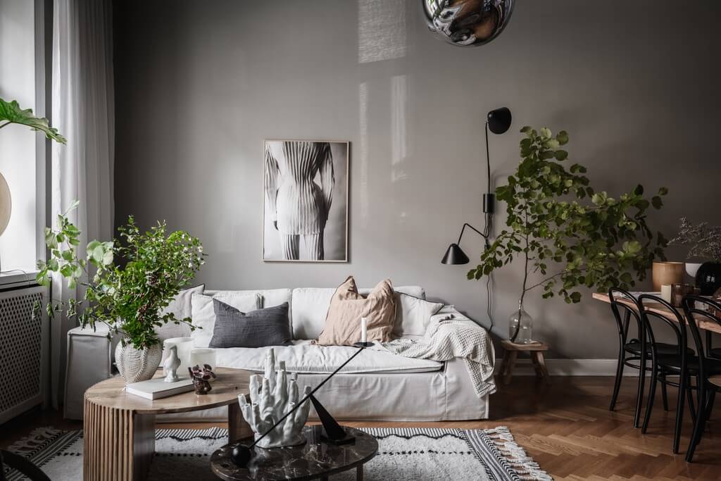 A Dark Gray Painted Ceiling in a Scandi Apartment 6 scandi-living-room-light-gray-walls-nordroom