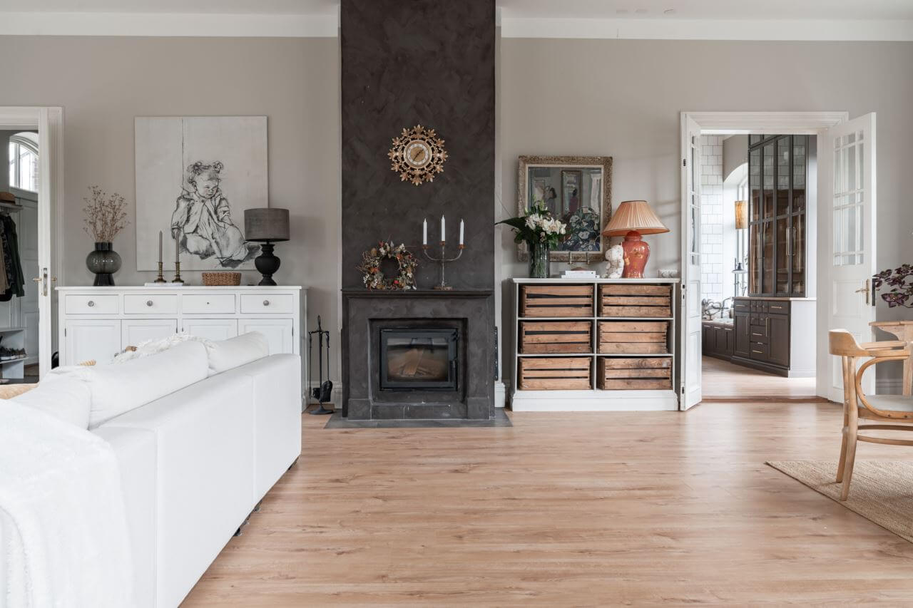 A Former Swedish School is Now a Beautiful Home 14 scandinavian-living-room-fireplace