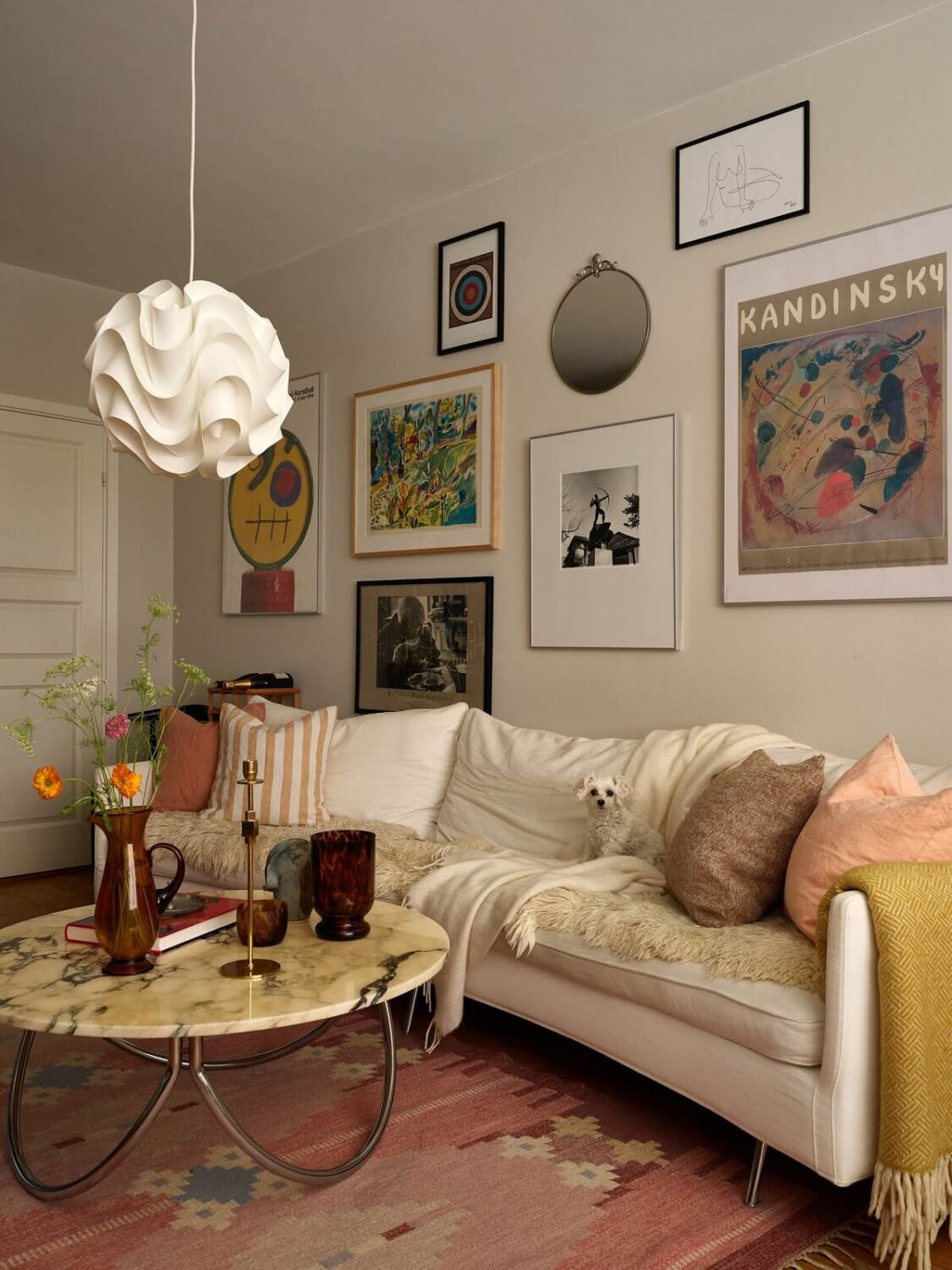A Scandinavian Apartment with a Fresh Blue Bedroom 8 scandinavian-living-room-layered-textiles-pink-rug-nordroom