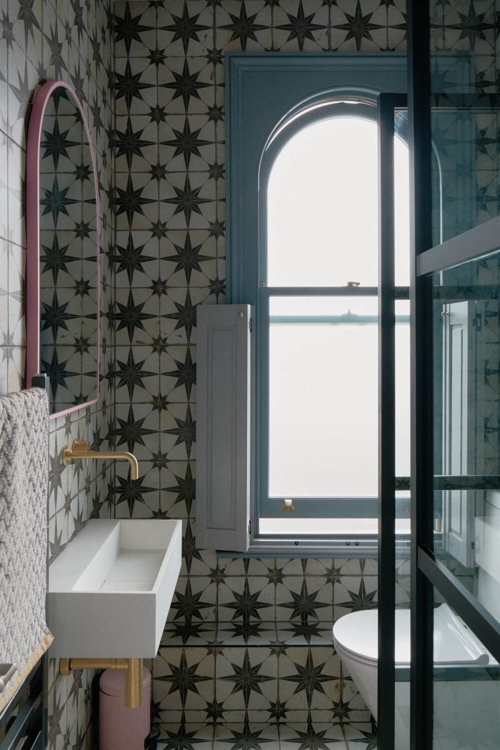 Best of 2023: Bathrooms 9 small-bathroom-blue-windowframe-tilework-nordroom