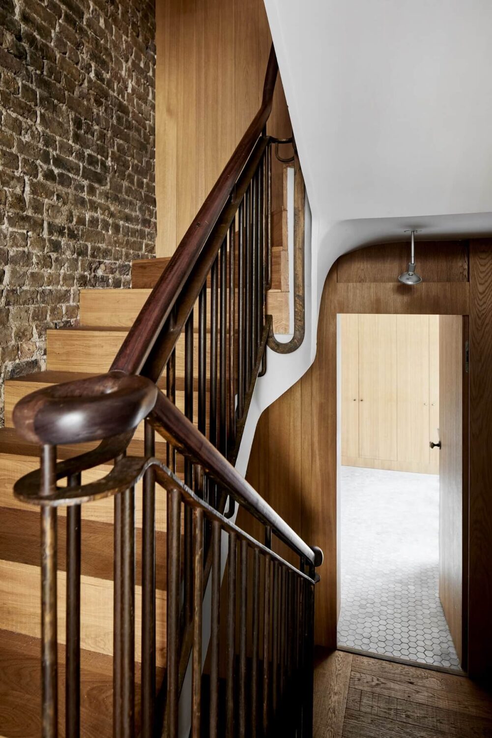 A Modern London Home with Custom Built Oak Furniture 8 staircase-brick-wall-nordroom