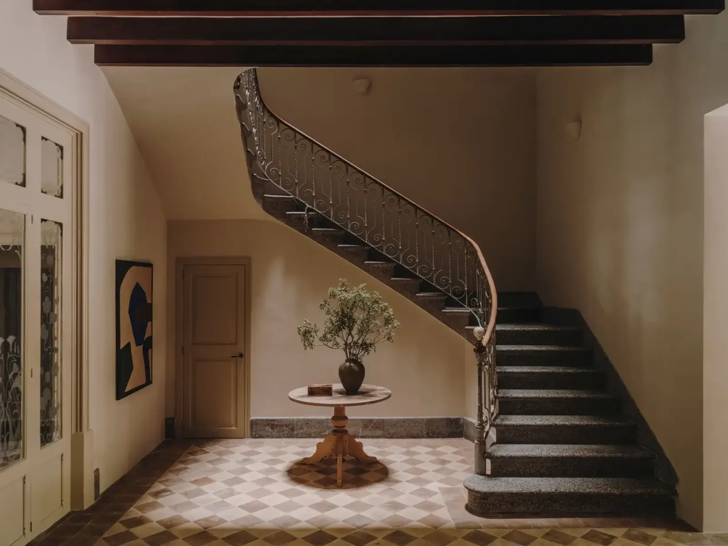A Historic Townhouse on Majorca with a Striped Pool 12 staircase-hallway-original-floor-tiles-nordroom
