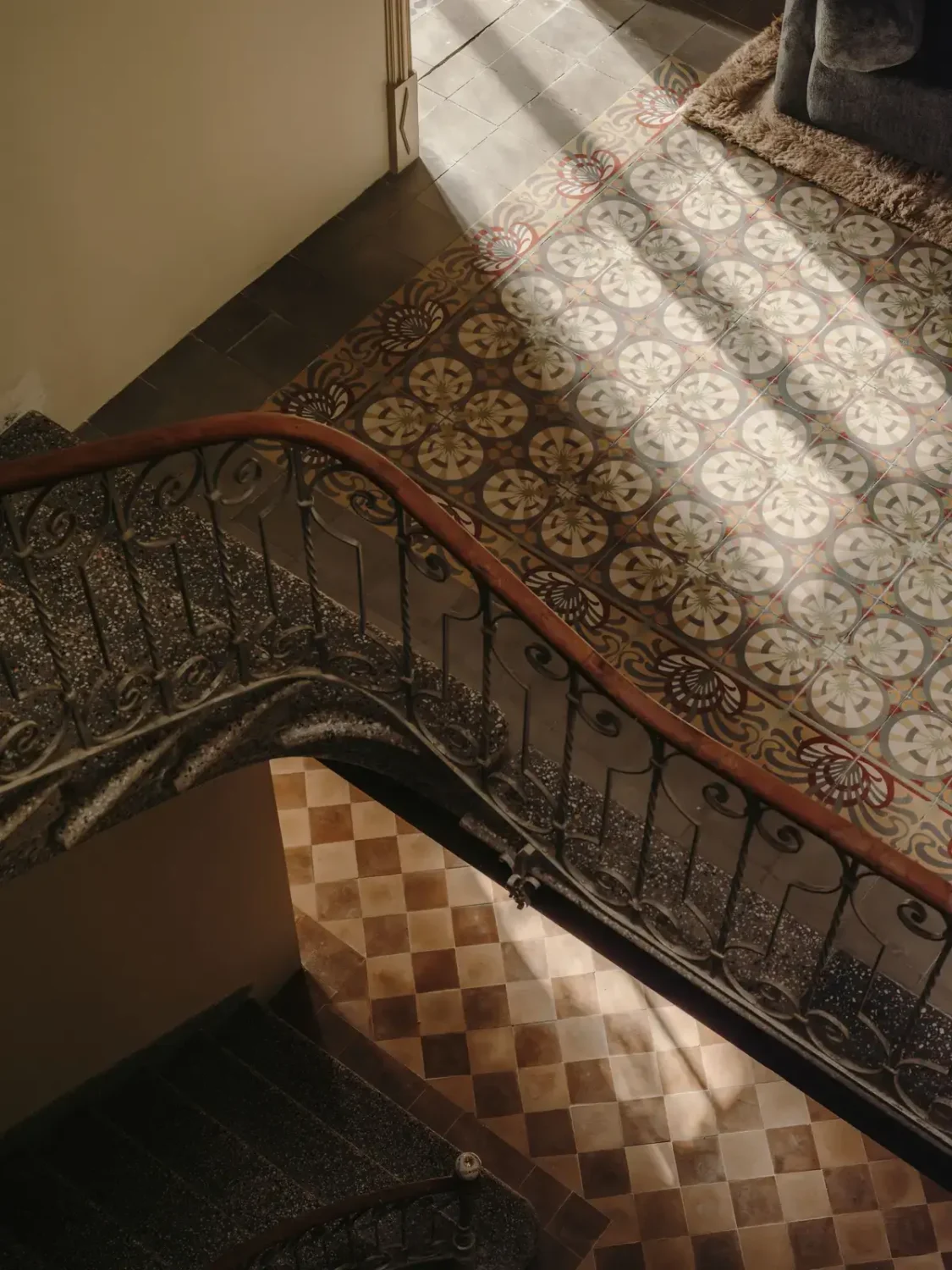 A Historic Townhouse on Majorca with a Striped Pool 13 staircase-with-original-floor-tiles-townhouse-mallorca-nordroom