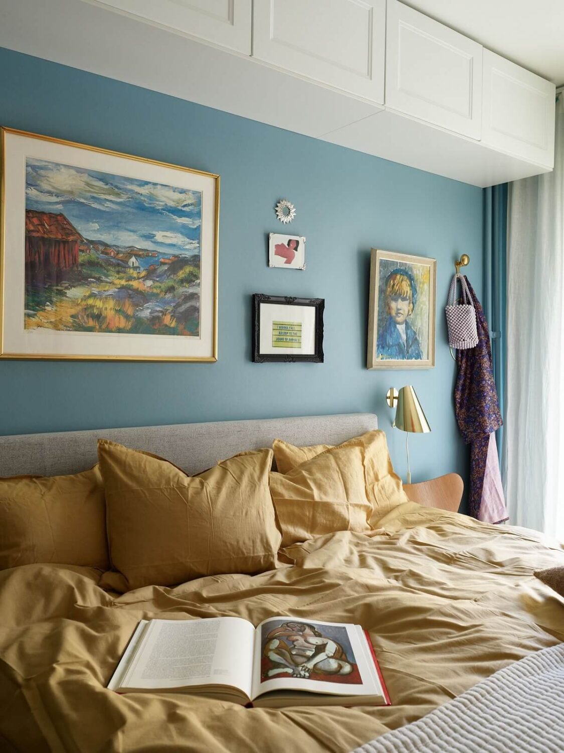 Dutch Boy Color of the Year 2025: Mapped Blue 15 vibrant-blue-bedroom-yellow-bedding-cabinets-over-bed-nordroom