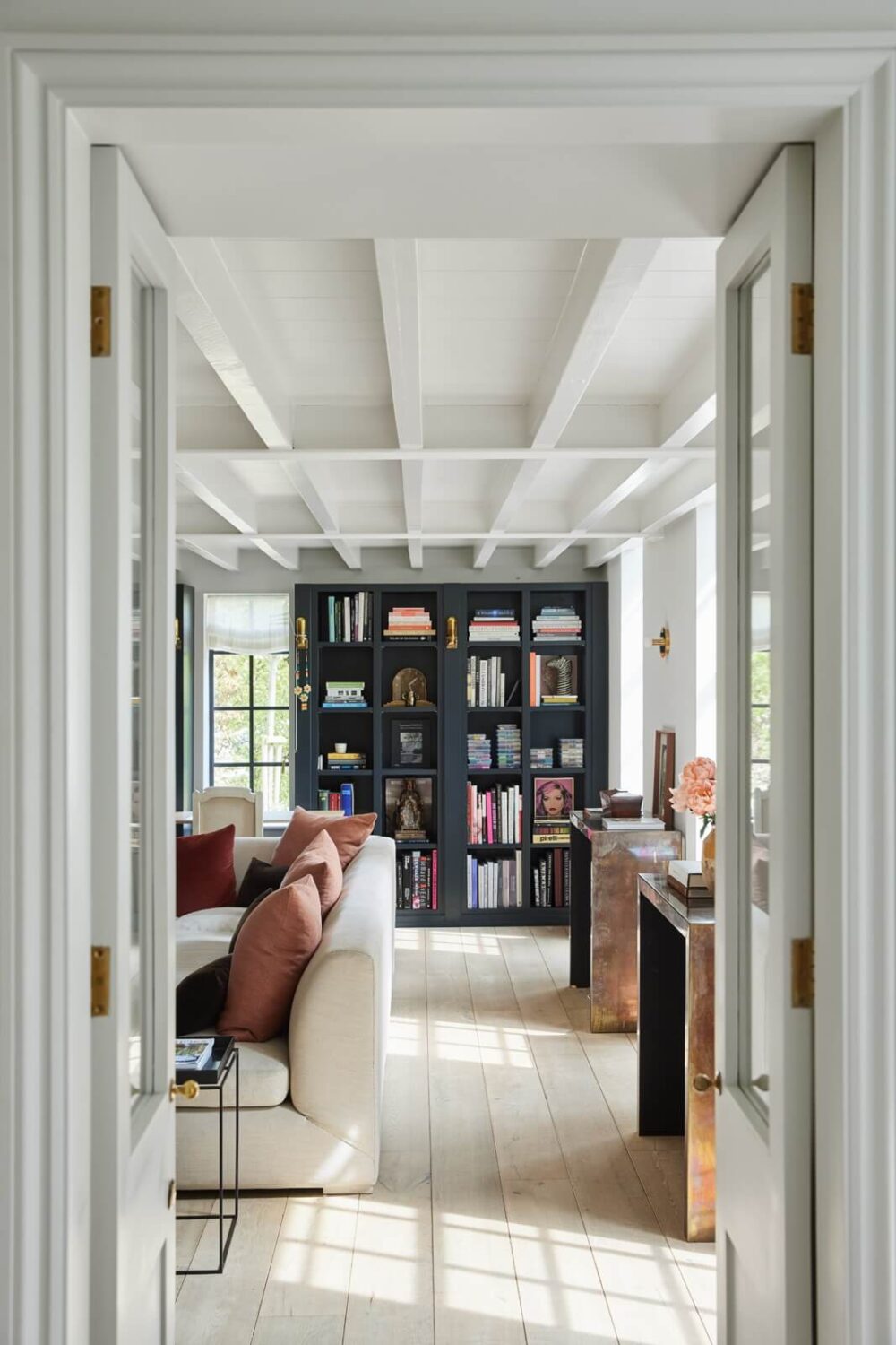 A Restored Georgian House with a Walled Garden 12 view-into-light-sitting-room-bookcases-nordroom