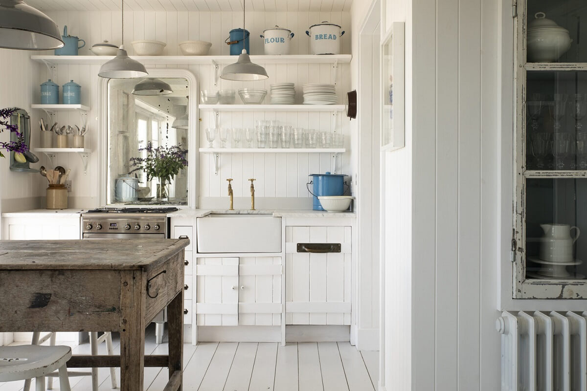 A Bright Coastal Home with Blue Color Accents in England 4 white-kitchen-coastal-butler-sink