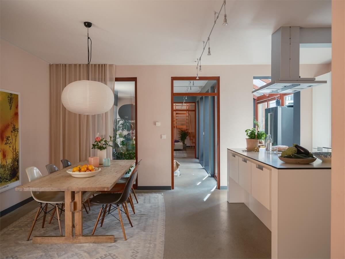 A Colorful Modern Townhouse in Malmö 1 white-kitchen-dining-table