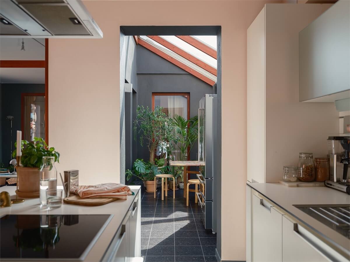 A Colorful Modern Townhouse in Malmö 3 white-kitchen-view-breakfast-room