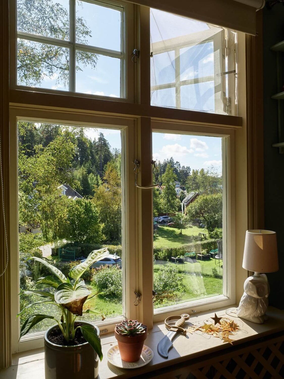 A Beautiful Swedish Country House with a Large Garden 16 window-garden-view-swedish-house