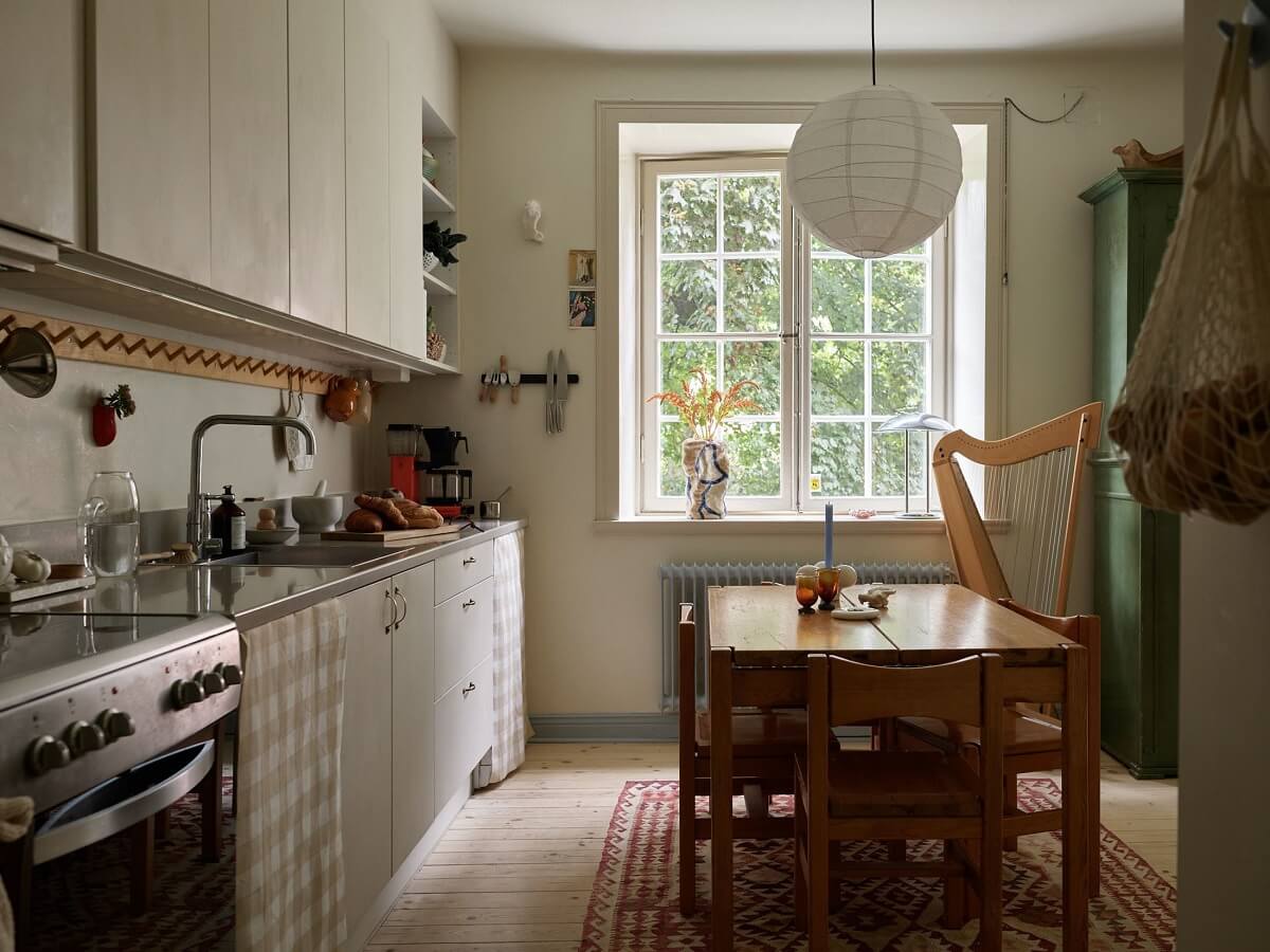 Sliding Glass Doors in a Scandinavian Apartment 19 wooden-dining-table-kitchen-nordroom