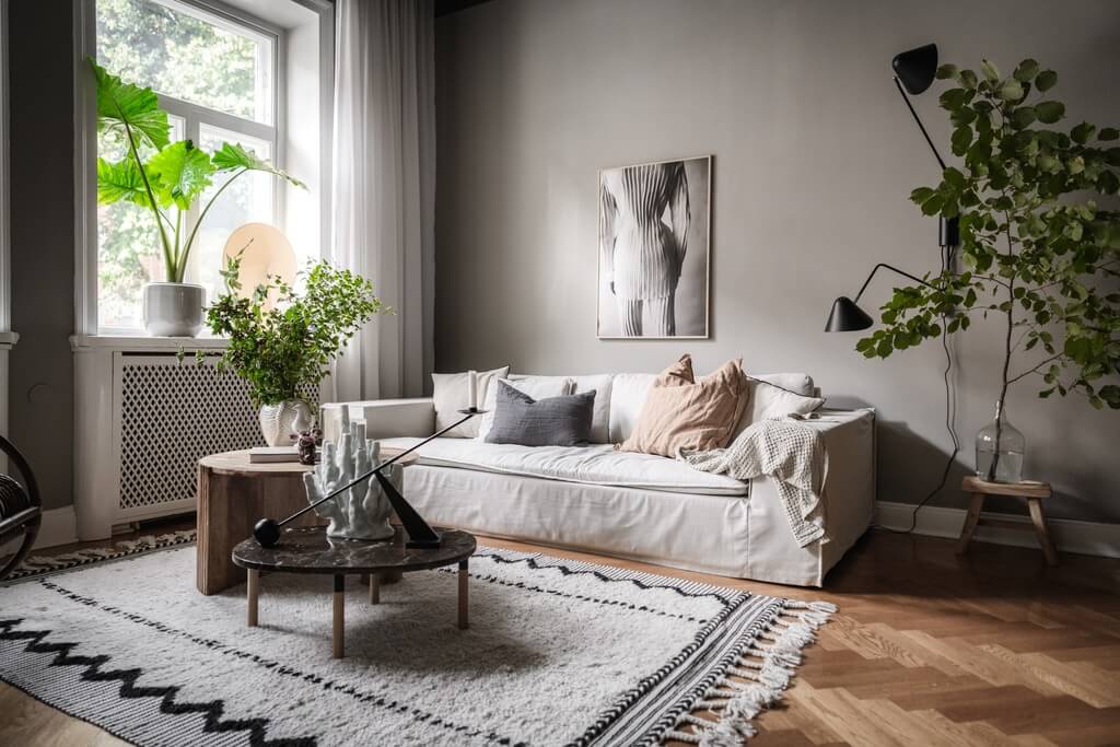 A Dark Gray Painted Ceiling in a Scandi Apartment 3 wooden-floor-gray-color-scheme-apartment-nordroom